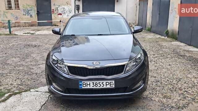 Серый Киа K5, объемом двигателя 2 л и пробегом 160 тыс. км за 9500 $, фото 1 на Automoto.ua