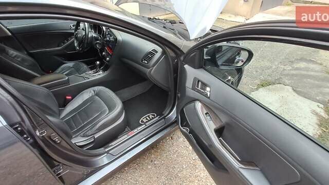 Серый Киа K5, объемом двигателя 2 л и пробегом 160 тыс. км за 9500 $, фото 21 на Automoto.ua