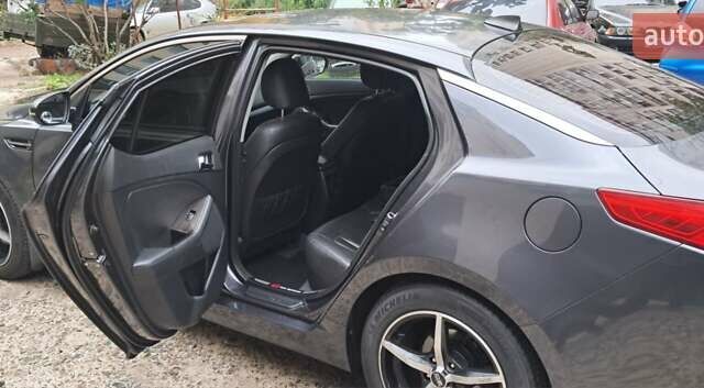 Серый Киа K5, объемом двигателя 2 л и пробегом 160 тыс. км за 9500 $, фото 11 на Automoto.ua