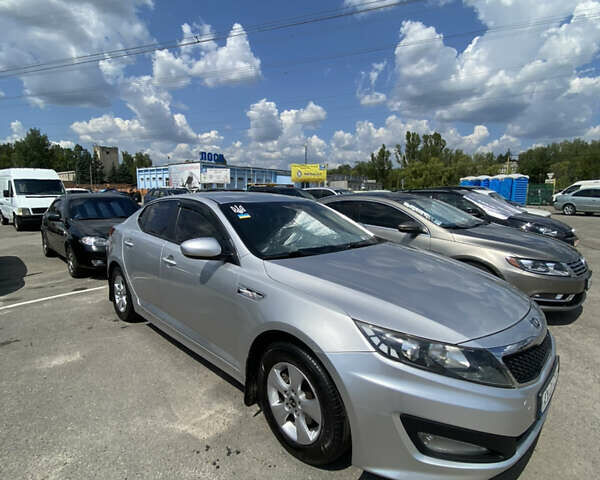 Серый Киа K5, объемом двигателя 2 л и пробегом 295 тыс. км за 7500 $, фото 6 на Automoto.ua
