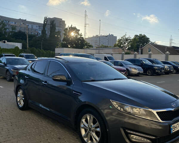 Серый Киа K5, объемом двигателя 2 л и пробегом 214 тыс. км за 7600 $, фото 3 на Automoto.ua