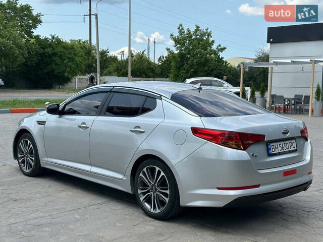 Серый Киа K5, объемом двигателя 2 л и пробегом 220 тыс. км за 8000 $, фото 5 на Automoto.ua