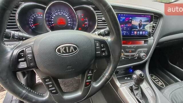 Серый Киа K5, объемом двигателя 2 л и пробегом 160 тыс. км за 9500 $, фото 20 на Automoto.ua