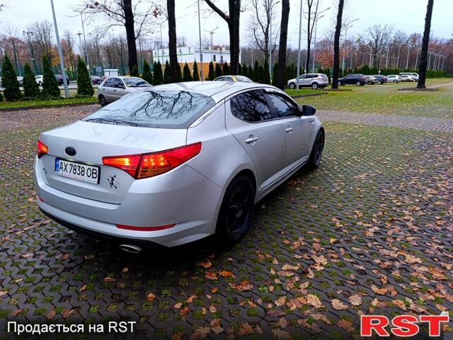 Серый Киа K5, объемом двигателя 2 л и пробегом 405 тыс. км за 7500 $, фото 4 на Automoto.ua