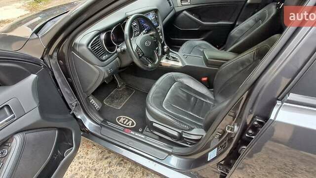 Серый Киа K5, объемом двигателя 2 л и пробегом 160 тыс. км за 9500 $, фото 15 на Automoto.ua