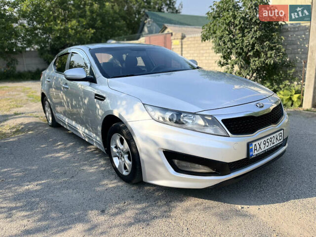 Серый Киа K5, объемом двигателя 2 л и пробегом 415 тыс. км за 6950 $, фото 13 на Automoto.ua