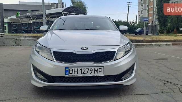 Серый Киа K5, объемом двигателя 2 л и пробегом 316 тыс. км за 7700 $, фото 1 на Automoto.ua