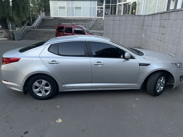 Серый Киа K5, объемом двигателя 2 л и пробегом 285 тыс. км за 6900 $, фото 1 на Automoto.ua