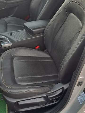 Серый Киа K5, объемом двигателя 2 л и пробегом 316 тыс. км за 7700 $, фото 12 на Automoto.ua