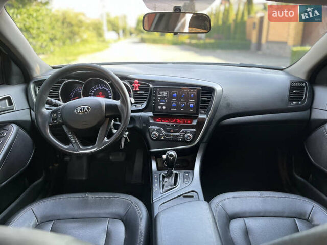 Серый Киа K5, объемом двигателя 2 л и пробегом 415 тыс. км за 6950 $, фото 20 на Automoto.ua
