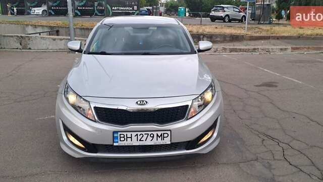 Серый Киа K5, объемом двигателя 2 л и пробегом 316 тыс. км за 7700 $, фото 9 на Automoto.ua