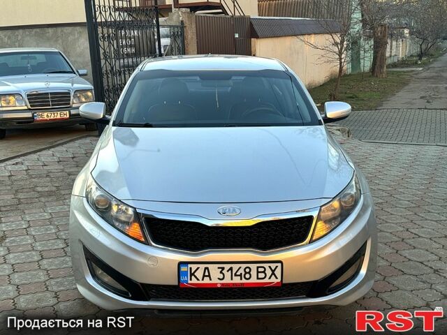 Серый Киа K5, объемом двигателя 2 л и пробегом 284 тыс. км за 6999 $, фото 1 на Automoto.ua
