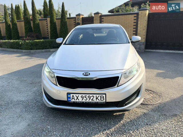 Серый Киа K5, объемом двигателя 2 л и пробегом 415 тыс. км за 6950 $, фото 1 на Automoto.ua