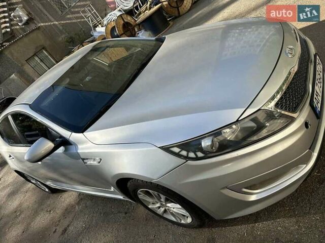 Серый Киа K5, объемом двигателя 2 л и пробегом 280 тыс. км за 6800 $, фото 9 на Automoto.ua
