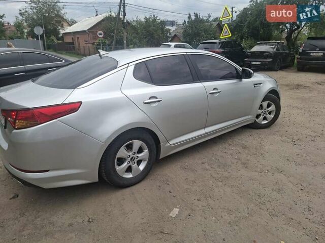 Серый Киа K5, объемом двигателя 2 л и пробегом 350 тыс. км за 7750 $, фото 2 на Automoto.ua