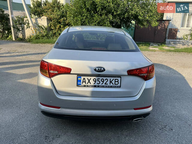 Серый Киа K5, объемом двигателя 2 л и пробегом 415 тыс. км за 6950 $, фото 6 на Automoto.ua