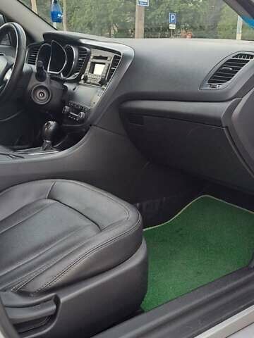 Серый Киа K5, объемом двигателя 2 л и пробегом 316 тыс. км за 7700 $, фото 13 на Automoto.ua