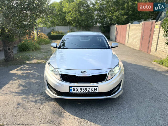 Серый Киа K5, объемом двигателя 2 л и пробегом 415 тыс. км за 6950 $, фото 7 на Automoto.ua