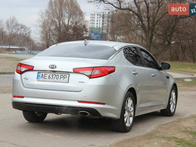 Серый Киа K5, объемом двигателя 2 л и пробегом 220 тыс. км за 9999 $, фото 8 на Automoto.ua