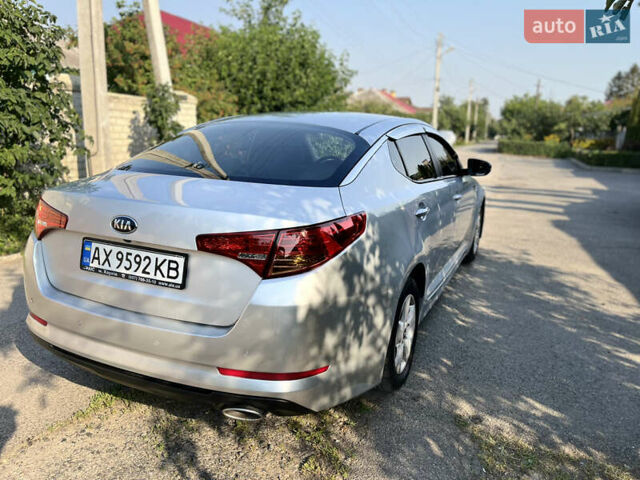 Серый Киа K5, объемом двигателя 2 л и пробегом 415 тыс. км за 6950 $, фото 11 на Automoto.ua
