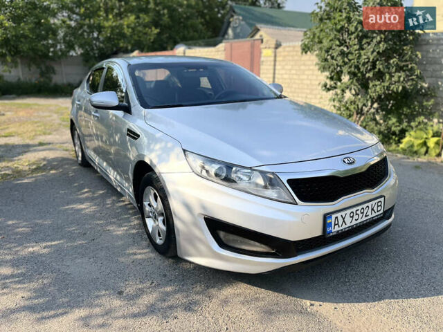 Серый Киа K5, объемом двигателя 2 л и пробегом 415 тыс. км за 6950 $, фото 15 на Automoto.ua