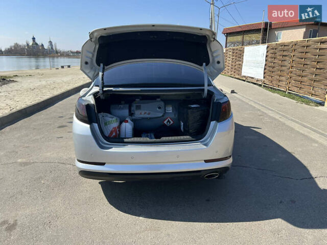Сірий Кіа K5, об'ємом двигуна 2 л та пробігом 248 тис. км за 9500 $, фото 18 на Automoto.ua
