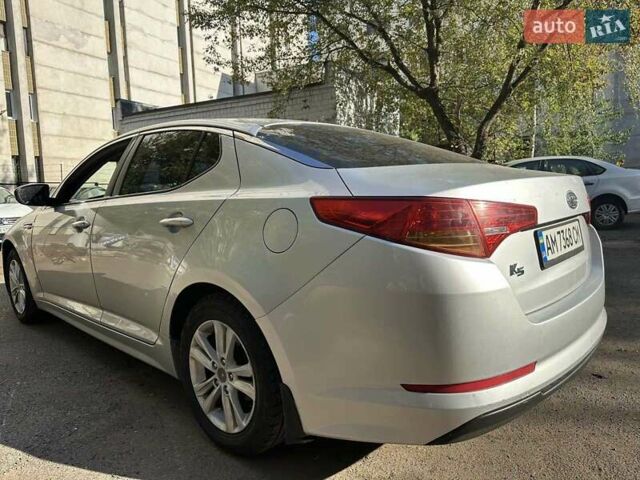 Серый Киа K5, объемом двигателя 2 л и пробегом 280 тыс. км за 6800 $, фото 6 на Automoto.ua