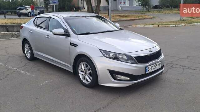 Серый Киа K5, объемом двигателя 2 л и пробегом 316 тыс. км за 7700 $, фото 8 на Automoto.ua