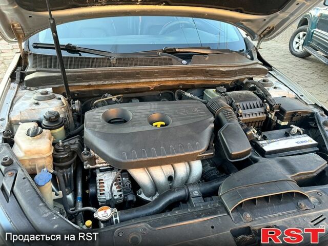 Серый Киа K5, объемом двигателя 2 л и пробегом 284 тыс. км за 6999 $, фото 11 на Automoto.ua