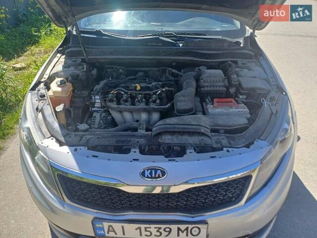 Серый Киа K5, объемом двигателя 2 л и пробегом 129 тыс. км за 5450 $, фото 10 на Automoto.ua