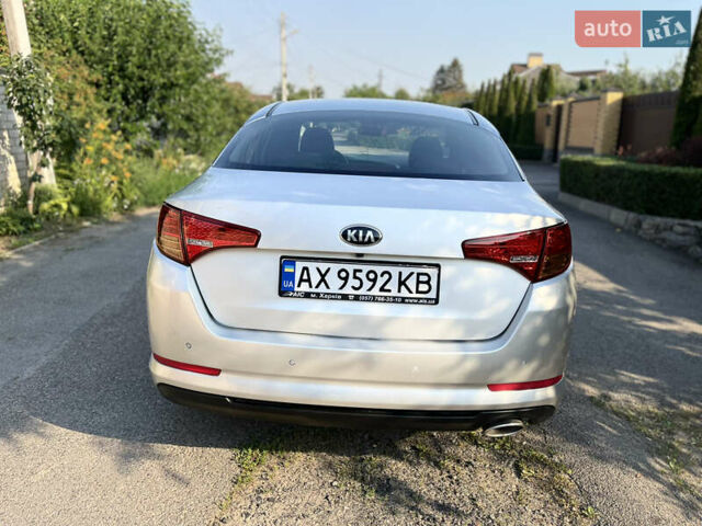 Серый Киа K5, объемом двигателя 2 л и пробегом 415 тыс. км за 6950 $, фото 10 на Automoto.ua