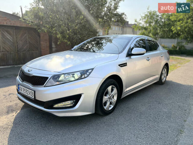 Серый Киа K5, объемом двигателя 2 л и пробегом 415 тыс. км за 6950 $, фото 8 на Automoto.ua
