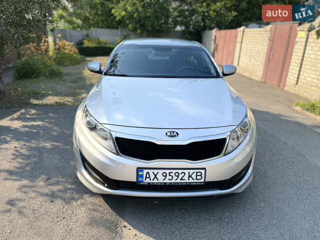 Серый Киа K5, объемом двигателя 2 л и пробегом 415 тыс. км за 6950 $, фото 14 на Automoto.ua