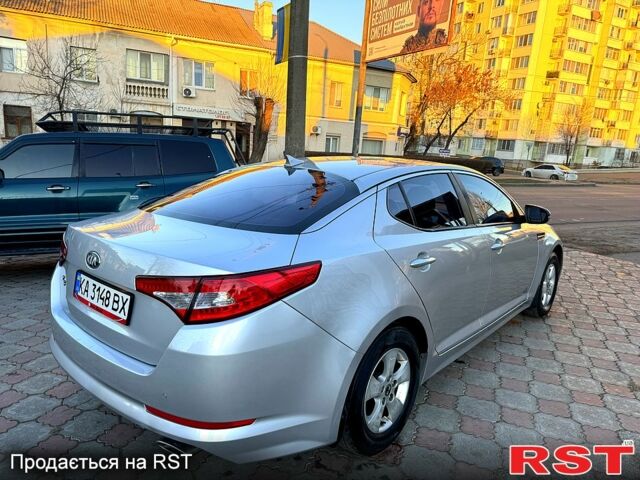 Серый Киа K5, объемом двигателя 2 л и пробегом 284 тыс. км за 6999 $, фото 3 на Automoto.ua