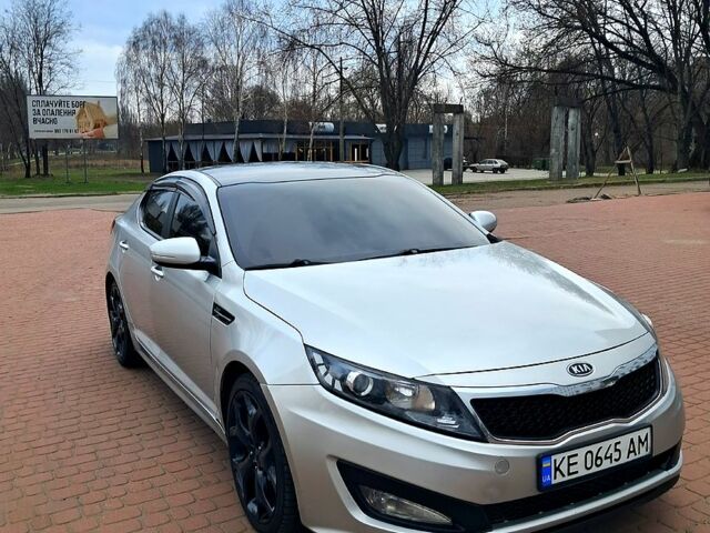 Серый Киа K5, объемом двигателя 2 л и пробегом 174 тыс. км за 8000 $, фото 1 на Automoto.ua