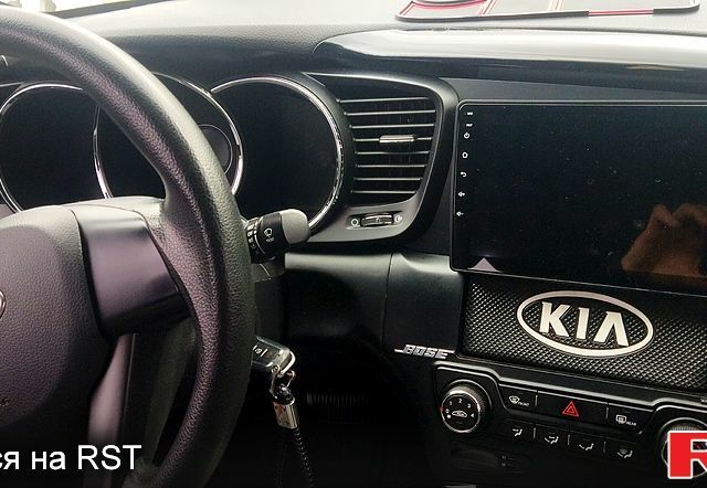 Серый Киа K5, объемом двигателя 2 л и пробегом 170 тыс. км за 10000 $, фото 5 на Automoto.ua