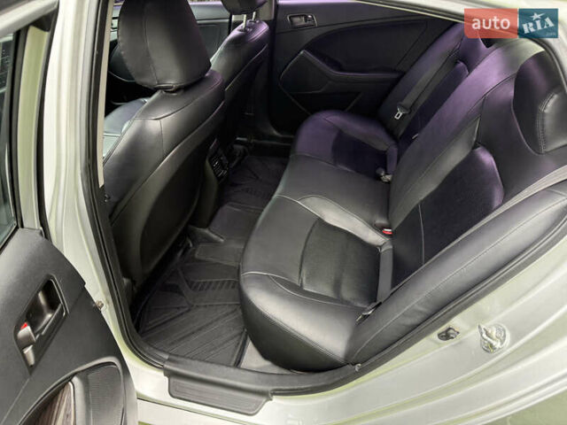 Серый Киа K5, объемом двигателя 2 л и пробегом 280 тыс. км за 7500 $, фото 11 на Automoto.ua