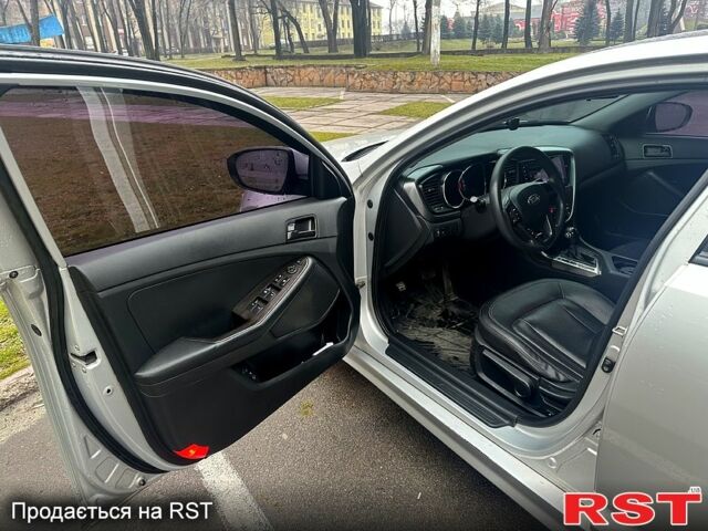 Серый Киа K5, объемом двигателя 2 л и пробегом 331 тыс. км за 8500 $, фото 4 на Automoto.ua