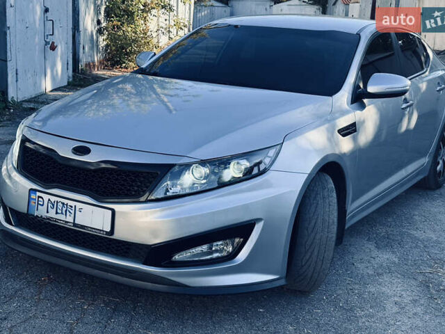 Сірий Кіа K5, об'ємом двигуна 2 л та пробігом 245 тис. км за 7899 $, фото 1 на Automoto.ua