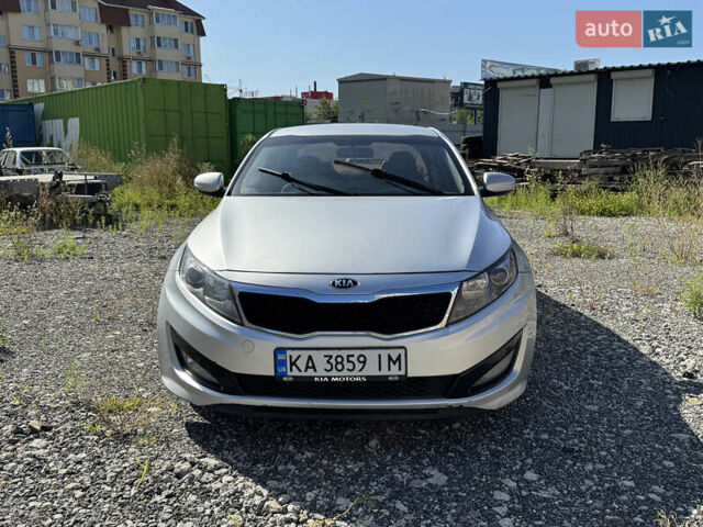 Серый Киа K5, объемом двигателя 2 л и пробегом 240 тыс. км за 6999 $, фото 1 на Automoto.ua
