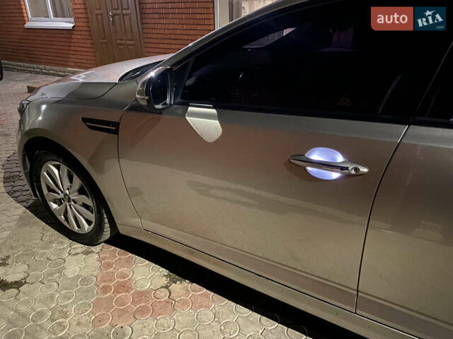 Сірий Кіа K5, об'ємом двигуна 2 л та пробігом 258 тис. км за 12200 $, фото 25 на Automoto.ua