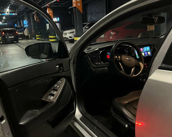 Серый Киа K5, объемом двигателя 2 л и пробегом 239 тыс. км за 8600 $, фото 11 на Automoto.ua
