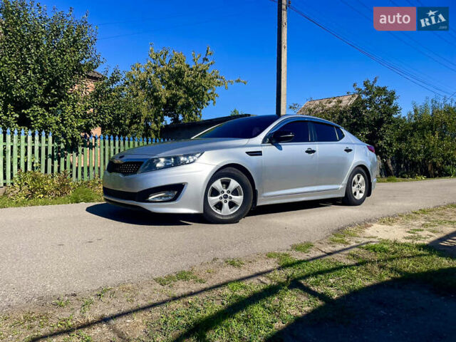 Сірий Кіа K5, об'ємом двигуна 2 л та пробігом 312 тис. км за 7999 $, фото 1 на Automoto.ua