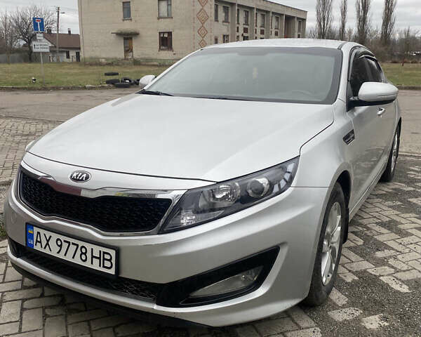 Серый Киа K5, объемом двигателя 2 л и пробегом 363 тыс. км за 7800 $, фото 3 на Automoto.ua