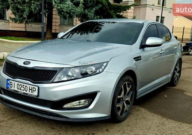 Серый Киа K5, объемом двигателя 2 л и пробегом 249 тыс. км за 8700 $, фото 5 на Automoto.ua