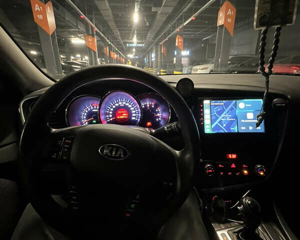 Серый Киа K5, объемом двигателя 2 л и пробегом 239 тыс. км за 8600 $, фото 17 на Automoto.ua