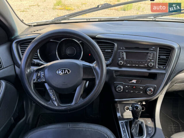Серый Киа K5, объемом двигателя 2 л и пробегом 240 тыс. км за 6999 $, фото 8 на Automoto.ua