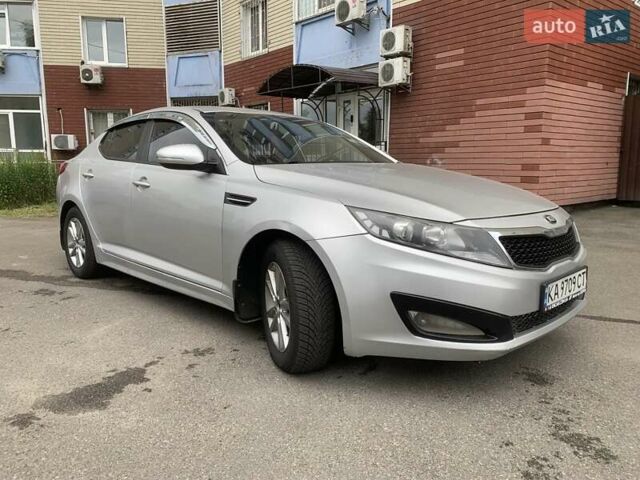 Серый Киа K5, объемом двигателя 2 л и пробегом 401 тыс. км за 7100 $, фото 17 на Automoto.ua