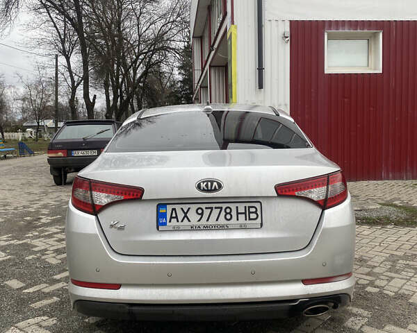 Серый Киа K5, объемом двигателя 2 л и пробегом 363 тыс. км за 7800 $, фото 2 на Automoto.ua