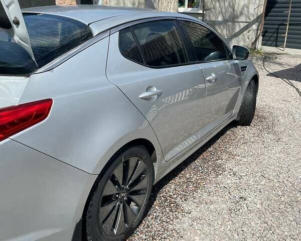 Серый Киа K5, объемом двигателя 2 л и пробегом 186 тыс. км за 8200 $, фото 11 на Automoto.ua